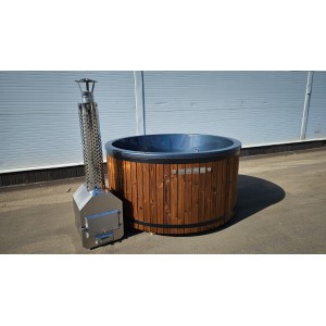 Round fiberglass hot tub with external heater