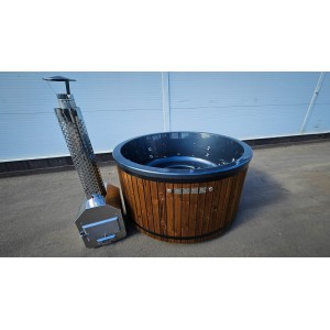 Round fiberglass hot tub with external heater