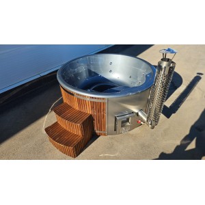 Round fiberglass hot tub with integrated heater