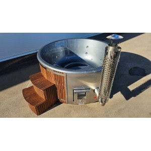 Round fiberglass hot tub with integrated heater